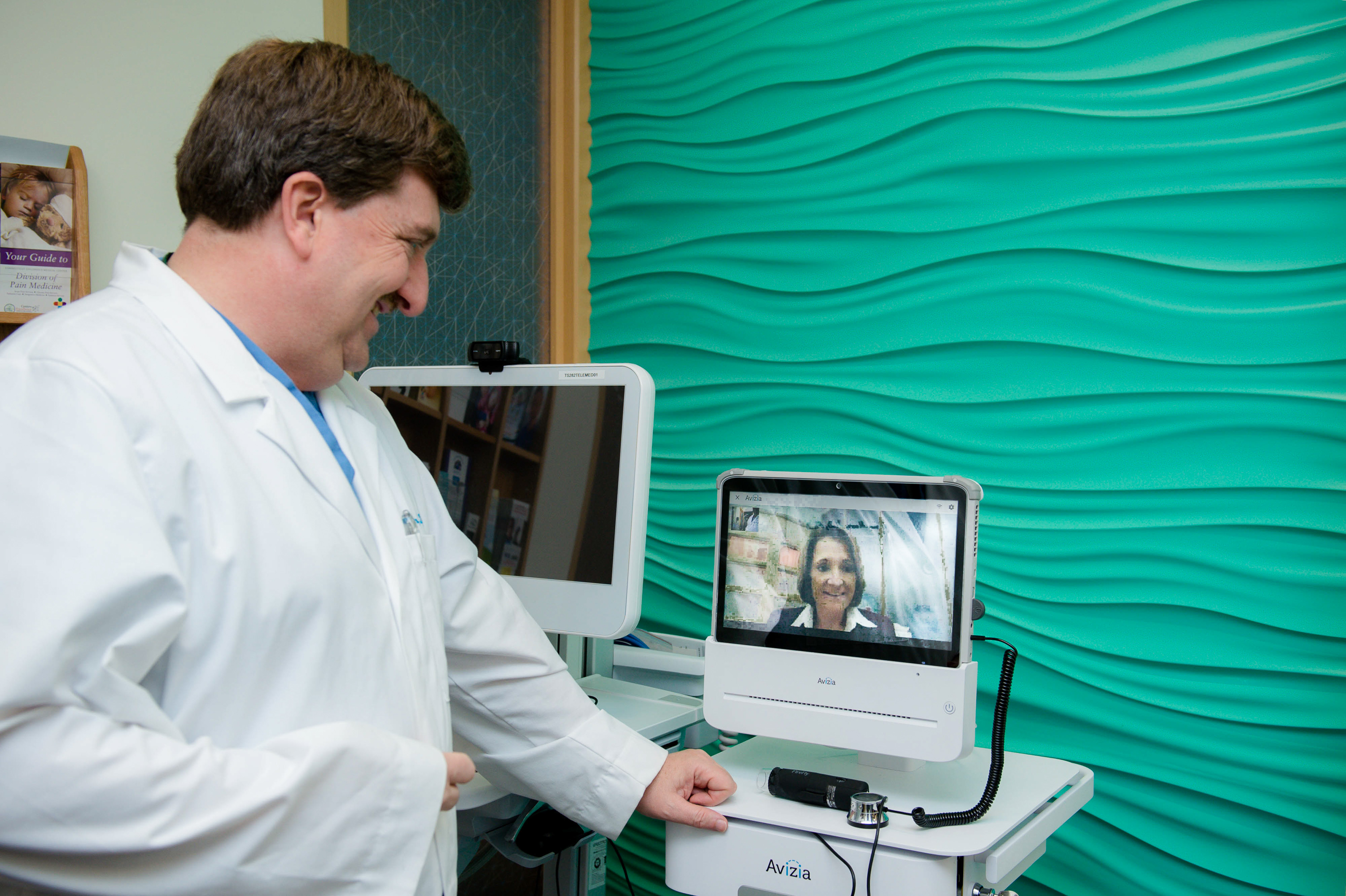 Dr. Moore uses the new technology to express his thanks to the donor.