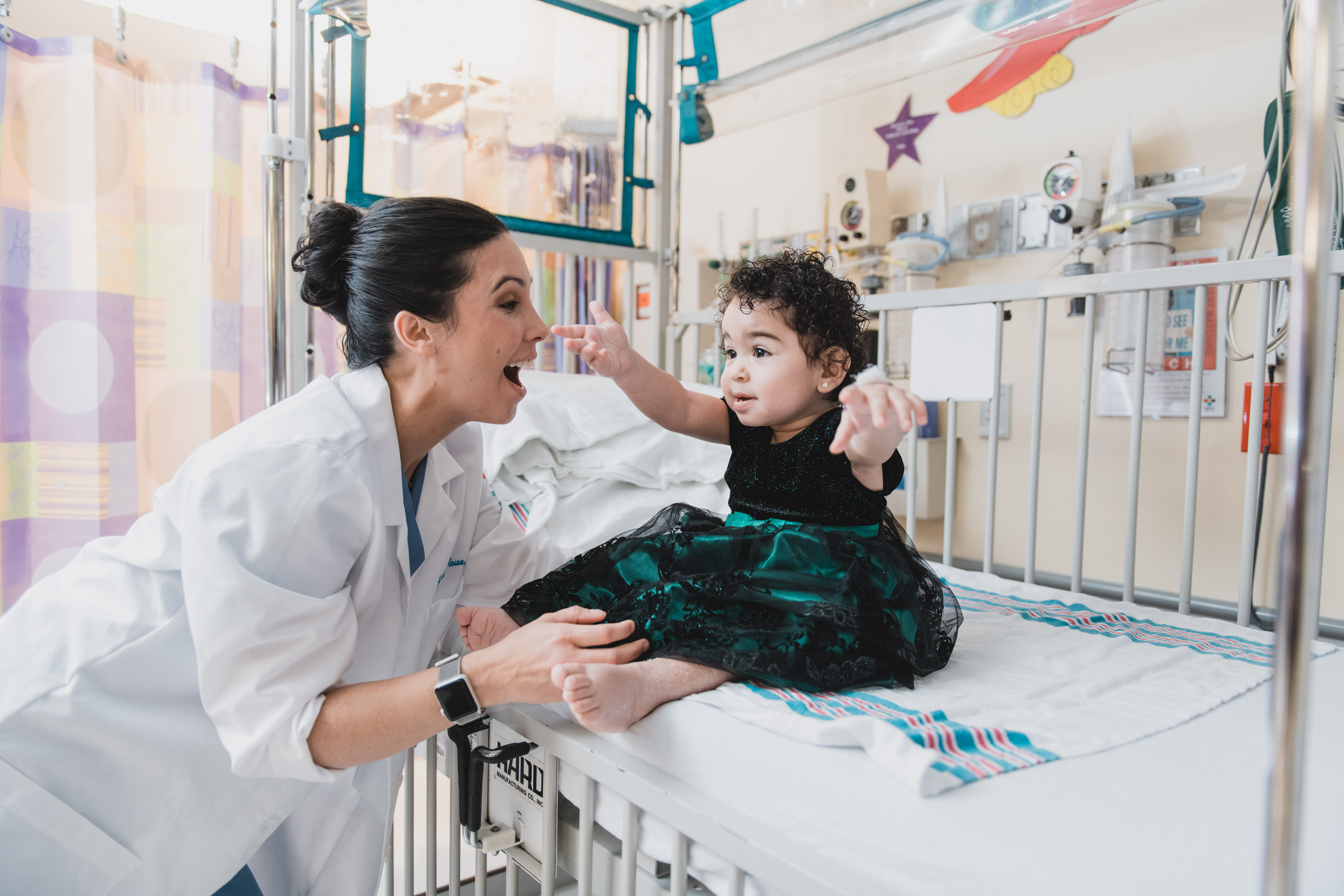 Dr. Courtney Rowe interacts with a patient.