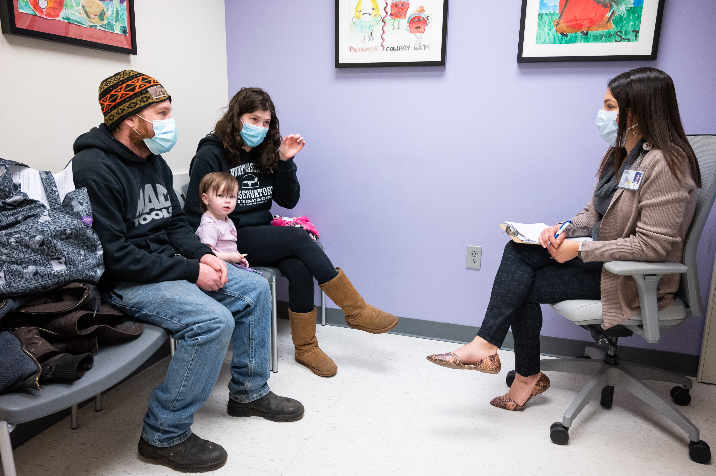 Dietitian Susan Goodine meets with Elora S. and her parents in a consultation room about her as-yet-unidentified malnutrition issues.