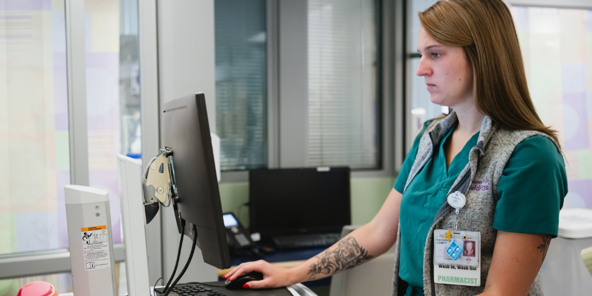 Pharmacist making rounds on inpatient floors.