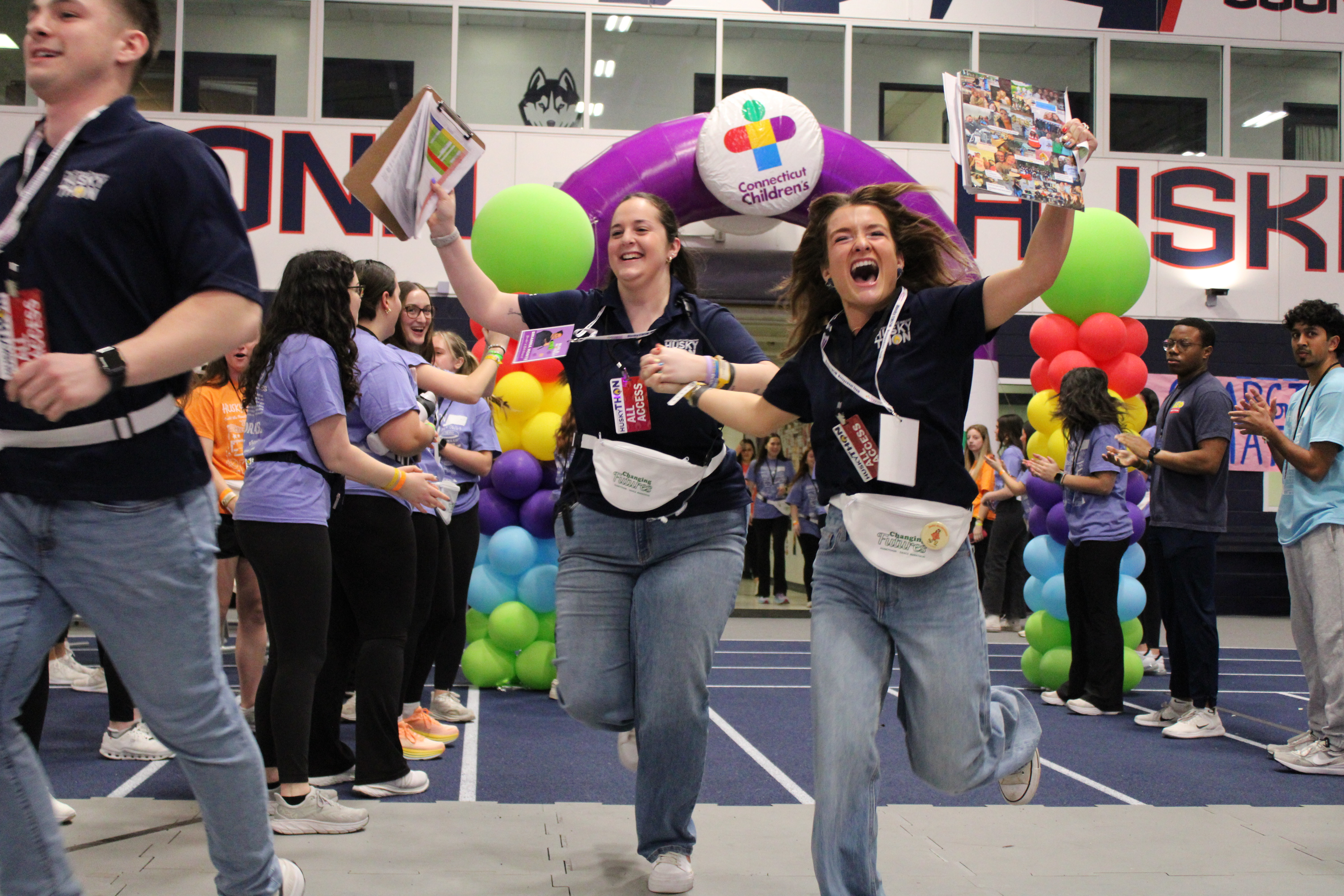 Mikey Mahoney and a friends make their entrance into HuskyTHON 2024