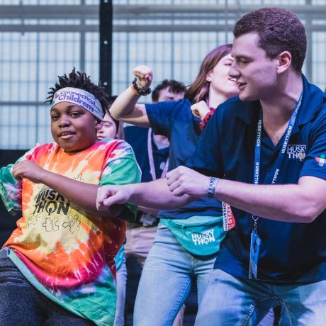 Shemar dancing with UCONN students at HuskyTHON