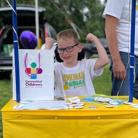 Michael celebrates the success of his Sip Stand for Connecticut Children's!