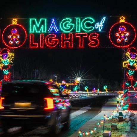 A holiday light display saying "Magic of Lights"