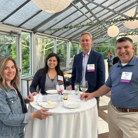 Connection members networking at an After Hours event
