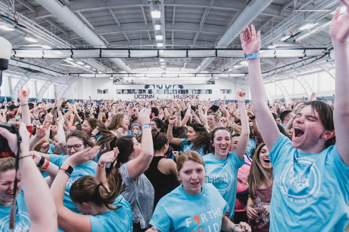 UConn Huskython students dance in a crowd