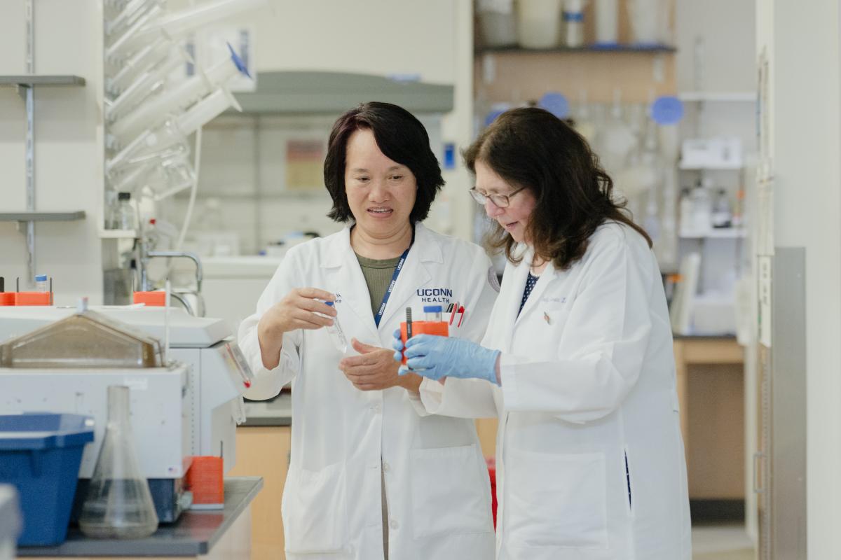 Emily Germain-Lee in her lab at UConn for the Research Institute