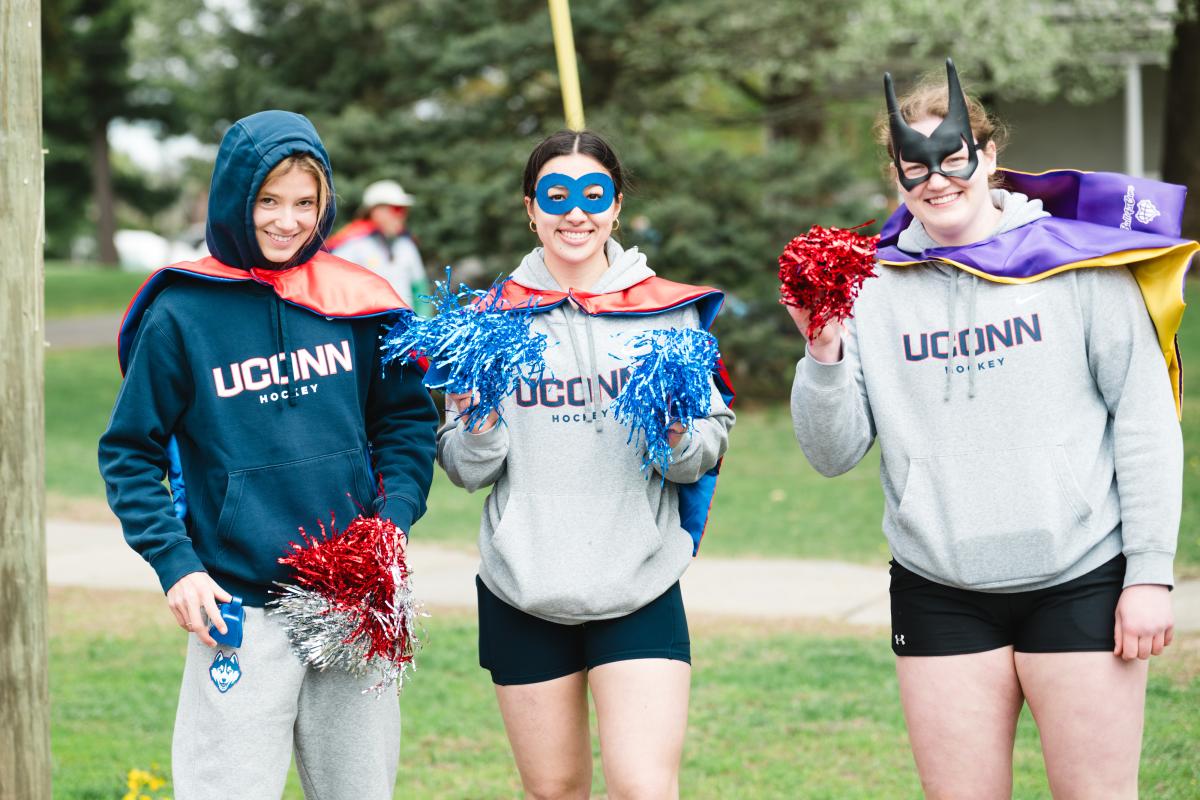 UConn supporters cheer from sidelines