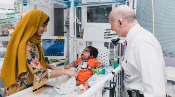 Mother and child in PICU with Dr Zucker